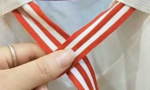 如何系蝴蝶結,蝴蝶結怎么系視頻慢動作圖1