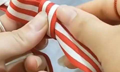 如何系蝴蝶結,蝴蝶結怎么系視頻慢動作圖5