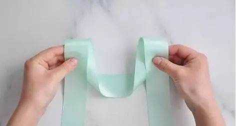 如何系蝴蝶結,蝴蝶結怎么系視頻慢動作圖8
