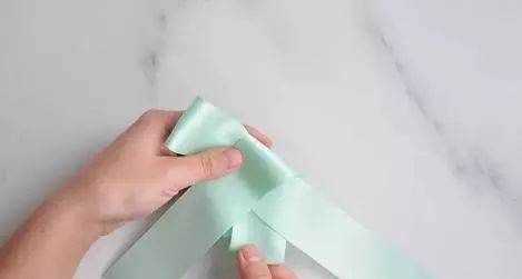 如何系蝴蝶結,蝴蝶結怎么系視頻慢動作圖10