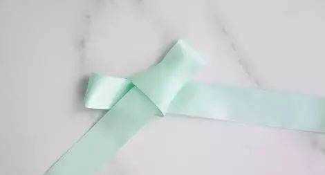 如何系蝴蝶結,蝴蝶結怎么系視頻慢動作圖12