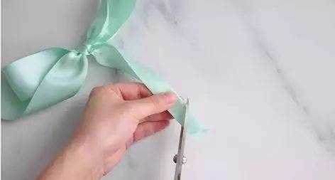 如何系蝴蝶結,蝴蝶結怎么系視頻慢動作圖16